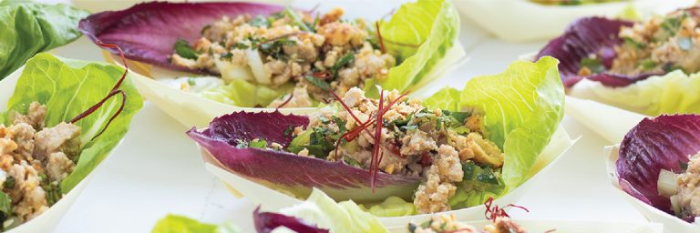 Individual lettuce and radicchio cups filled with a light, herby, pork mixture, the kind of smaller, more considered portions our GLP-1 research is seeing